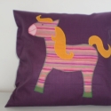  Lila csíkos lovacskás párna , Baba-mama-gyerek, Játék, Dekoráció, Gyerekszoba, Patchwork, foltvarrás, Lila pamutvászonra applikáltam Őcsíkosságát. Mérete: 38 X 38 cm. Külön belső párna szolgál töltetül,..., Meska