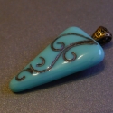 Fosszilia, Ékszer, óra, Medál, Ékszerkészítés, Üvegművészet, Szép világoskék üvegbe kacskaringós lenyomatot olvasztottam.
4,2 x 2,3 cm méretű akasztó nélkül.
Átt..., Meska