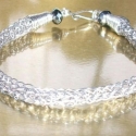 Fémesfény karlánc, Ékszer, óra, Ruha, divat, cipő, Karkötő, Ékszerkészítés, Fémmegmunkálás, Ékszerdrótból készített, 19cm hosszú viking karkötő, végeit ónixkristályok díszítik.

Antikolt, lakk..., Meska