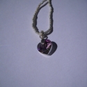 Lila Swarovski szív medál ezüst gyöngy láncon, Ékszer, óra, Nyaklánc, Gyöngyfűzés, 10*10,5 mm-es swarovszki szív ezüst színű láncon.

A szív medál lila ab-s színű, a lánc része galvan..., Meska
