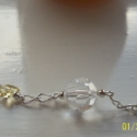 Swarovski pillangós kari, Ékszer, óra, Karkötő, Ékszerkészítés, Szövés, Középen 1cm átmérőjű Swarovski gömböcske ékeskedik,mellette mindkét oldalon pici sárga szintén Swaro..., Meska