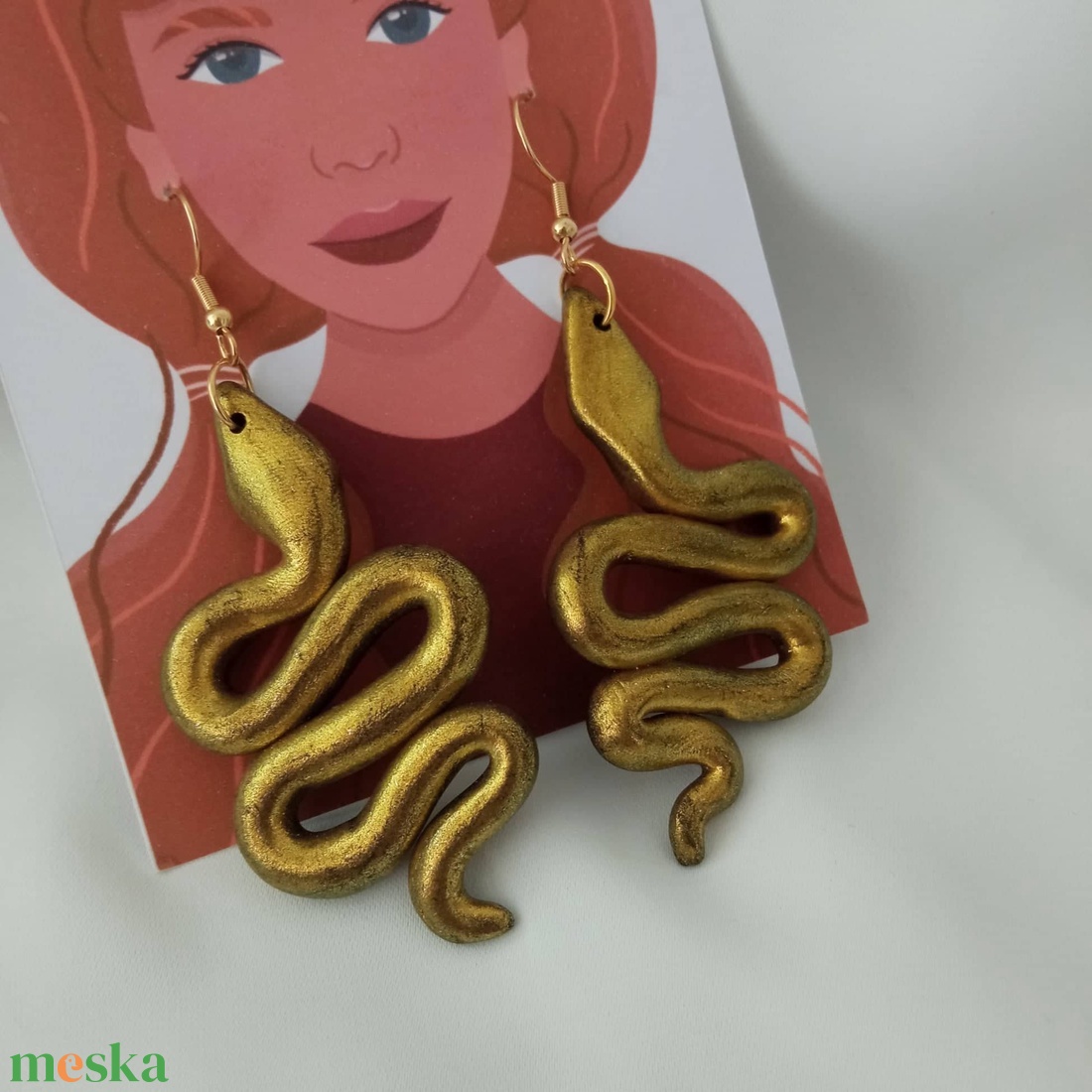 Arany csillogós kígyós fülbevaló - ékszer - fülbevaló - lógó fülbevaló - Meska.hu