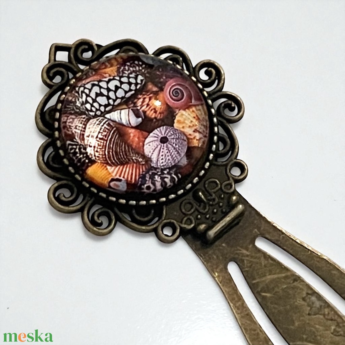 A mélység titka tengeri kagyló mintázatú üveglencsés fém vintage stílusú könyvjelző ajándék - könyv & zene - könyvjelző - Meska.hu A mélység titka tengeri kagyló mintázatú üveglencsés fém vintage stílusú könyvjelző ajándék - könyv & zene - könyvjelző - Meska.hu