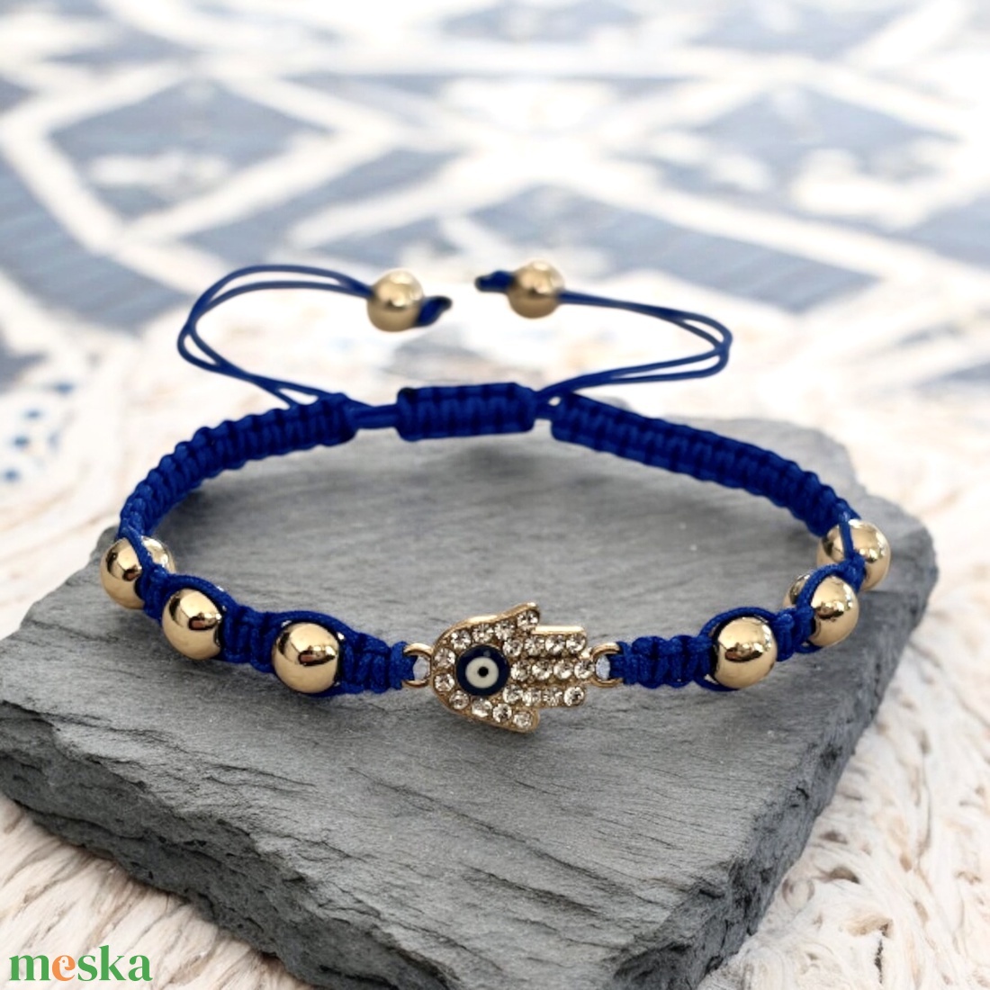 Csomózott makramé állítható méretű védelmező Hamsa kéz karkötő arany színű hematit gyöngyökkel sötétkék 5637353 - ékszer - karkötő - ásványkarkötő - Meska.hu