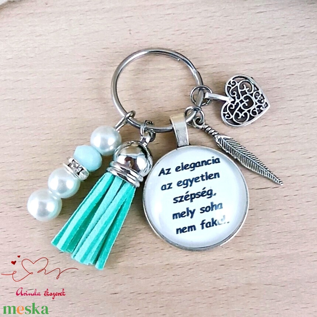 Az elegancia az egyetlen szépség feliratos menta bojtos üveglencsés kulcstartó táskadísz  - táska & tok - kulcstartó & táskadísz - táskadísz - Meska.hu