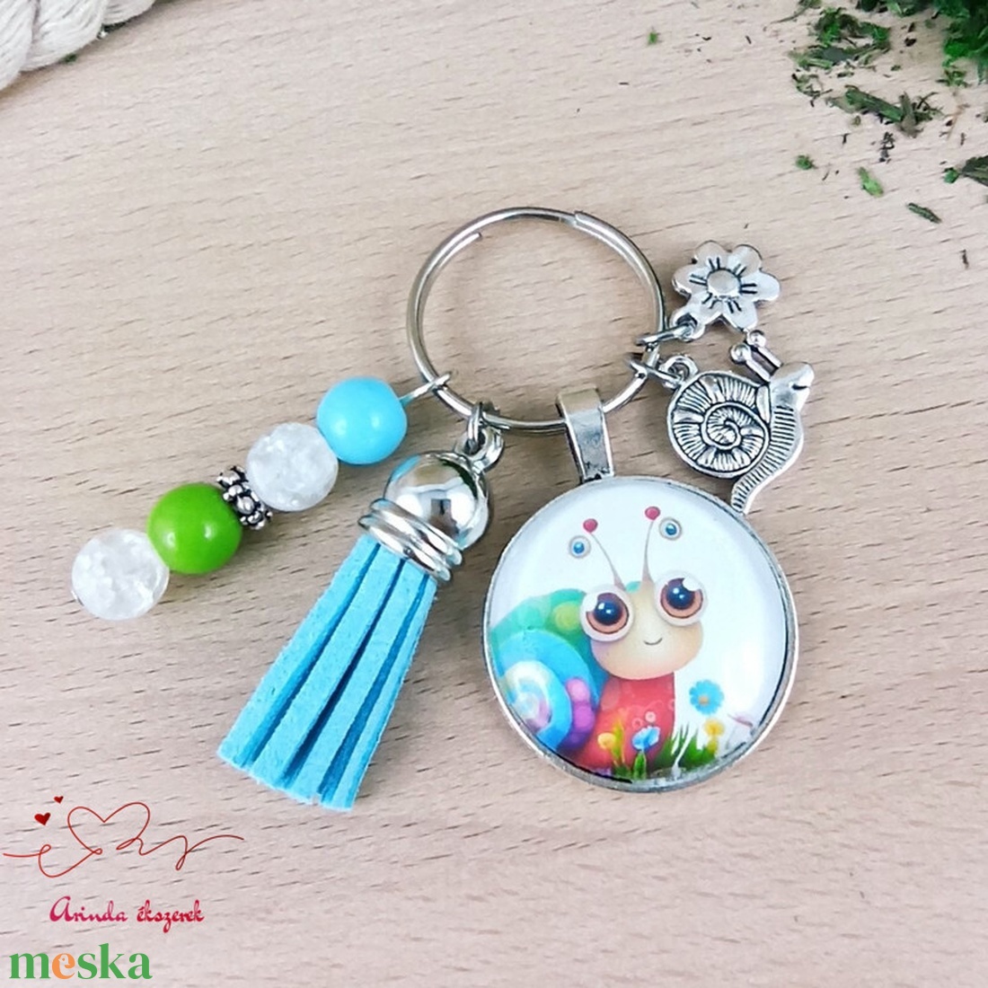 Csigás üveglencsés kulcstartó kék bojttal � cuki ajándék gyerekeknek - táska & tok - kulcstartó & táskadísz - kulcstartó - Meska.hu