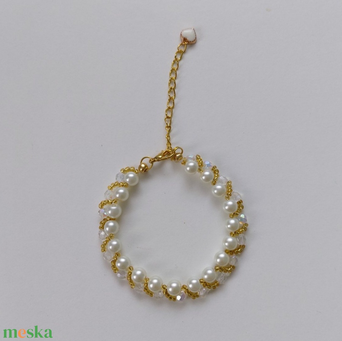 Elegáns ekrü gyöngykarkötő állítható aranylánccal - ékszer - karkötő - gyöngyös karkötő - Meska.hu Elegáns ekrü gyöngykarkötő állítható aranylánccal - ékszer - karkötő - gyöngyös karkötő - Meska.hu