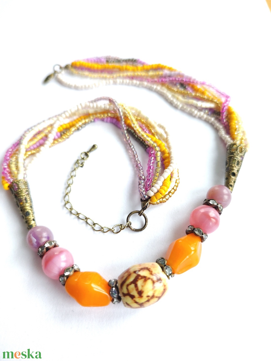 8 soros rózsaszín és narancssárga tarka gyöngy nyaklánc - kézzel festett kerámia gyönggyel a közepén  - ékszer - nyaklánc - gyöngyös nyaklánc - Meska.hu