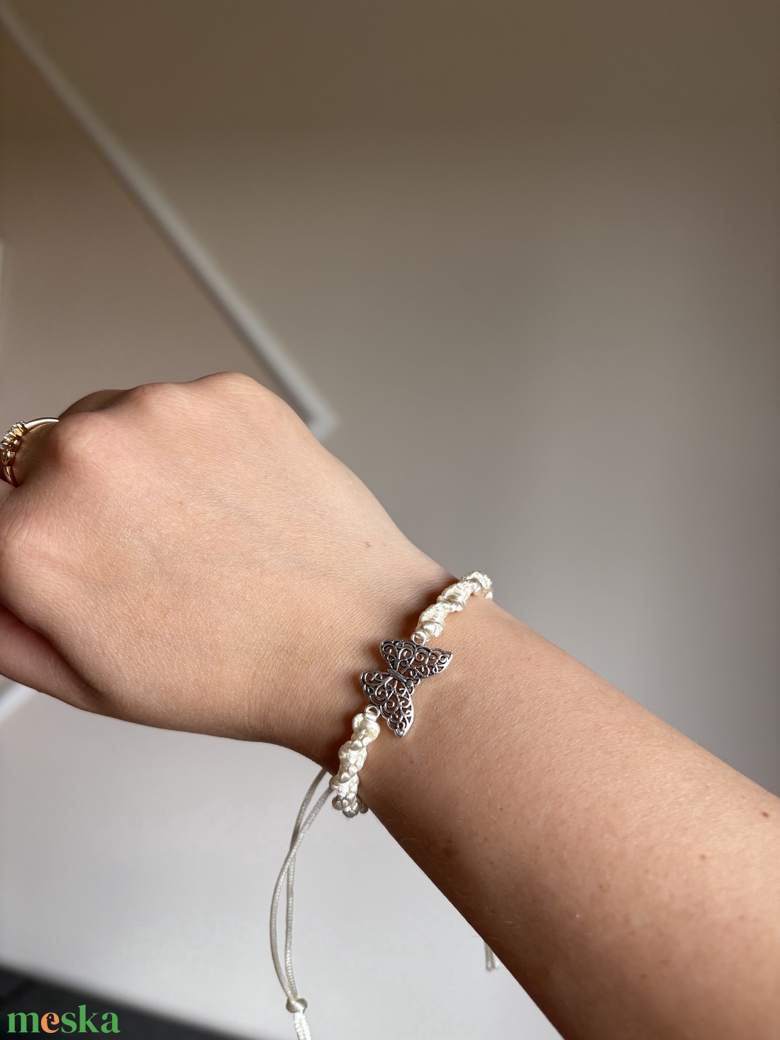 Spirálcsomós pillangós karkötő - ékszer - karkötő - fonott karkötő - Meska.hu