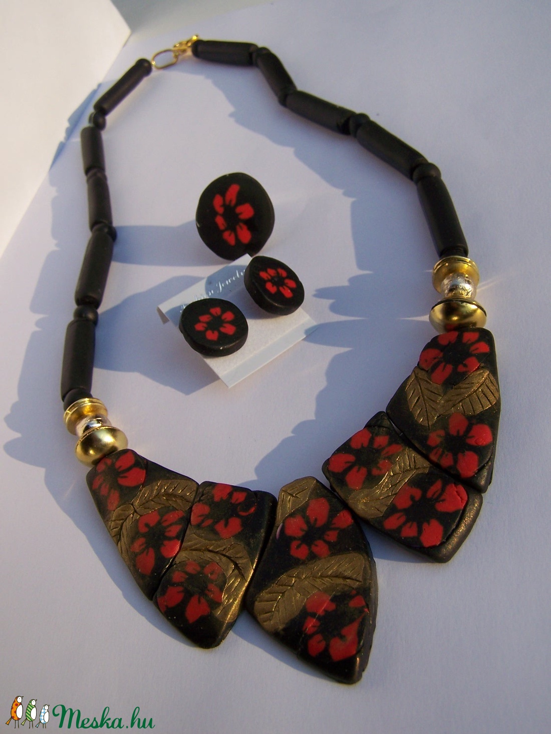 Desigual mintás nyaklánc-gyűrű-fülbevaló szett, fekete-piros-arany -  - Meska.hu