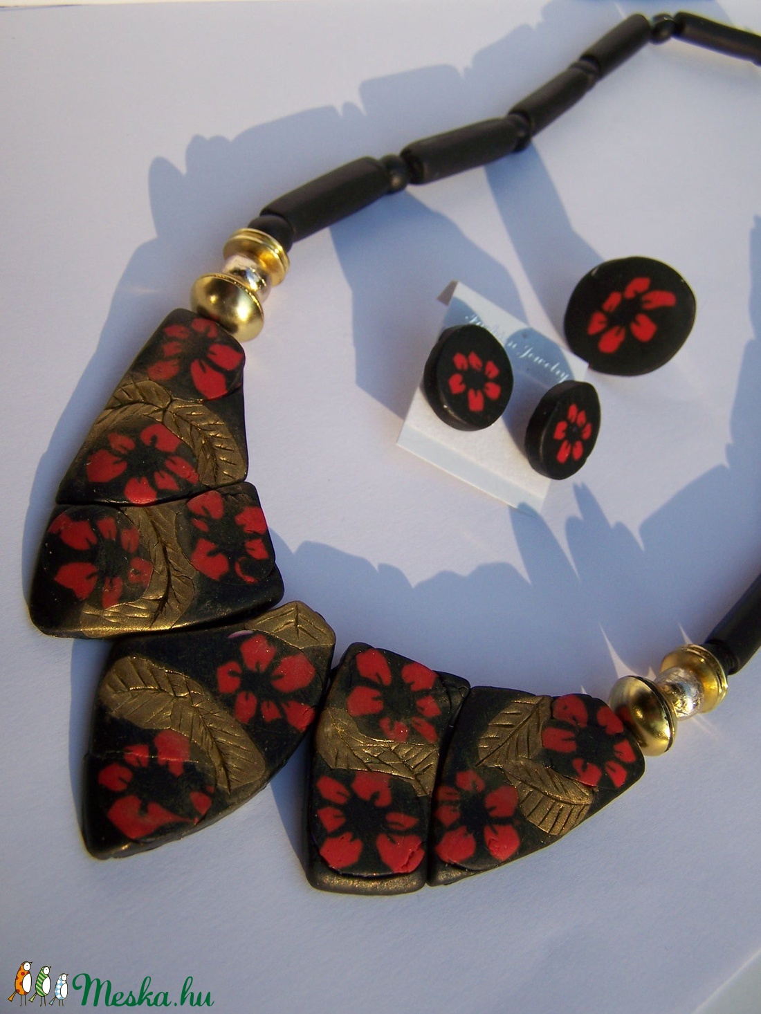 Desigual mintás nyaklánc-gyűrű-fülbevaló szett, fekete-piros-arany -  - Meska.hu