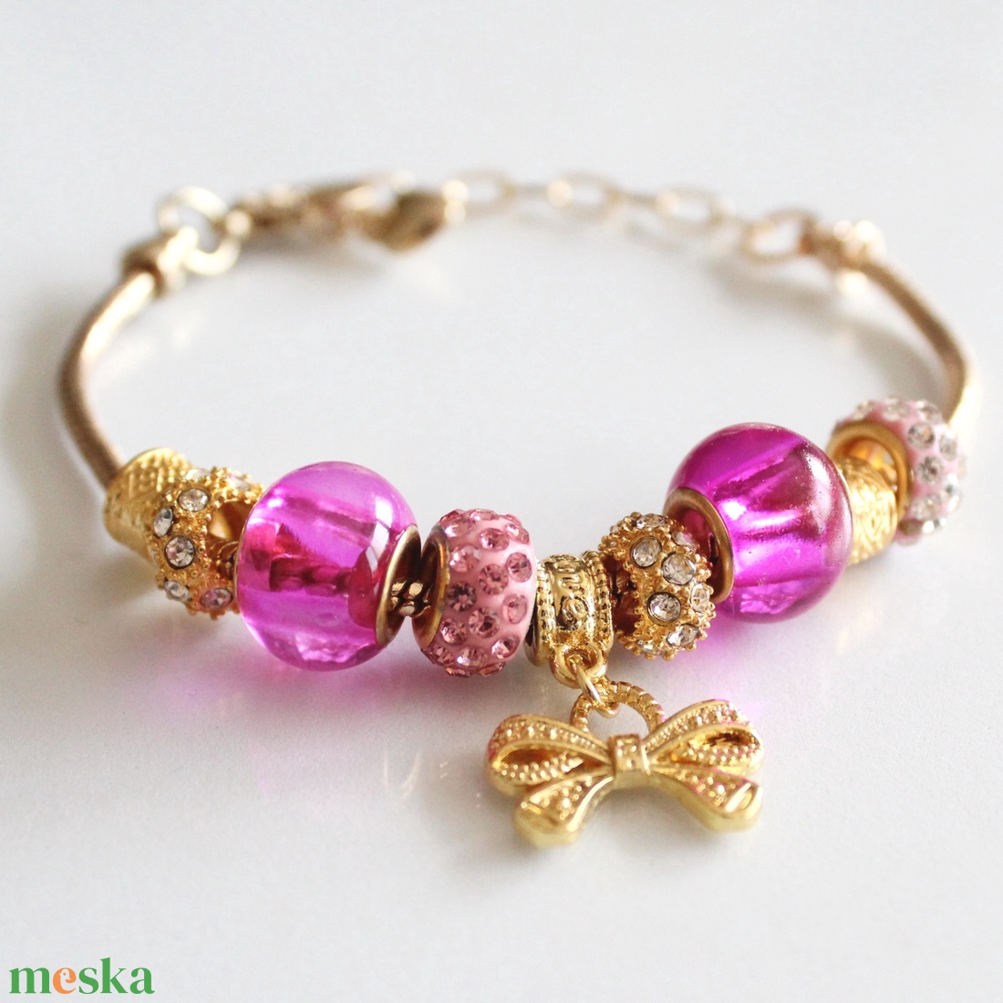 Pink pandora stílusú karkötő arany színű alapon - ékszer - karkötő - charm karkötő - Meska.hu Pink pandora stílusú karkötő arany színű alapon - ékszer - karkötő - charm karkötő - Meska.hu