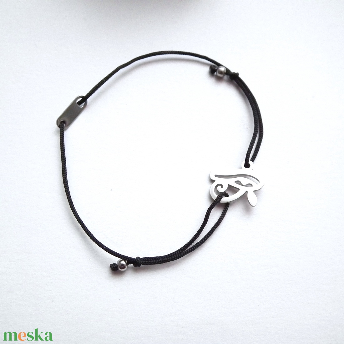 Hórusz szeme... nemesacél zsinór karkötő - ékszer - karkötő - charm karkötő - Meska.hu