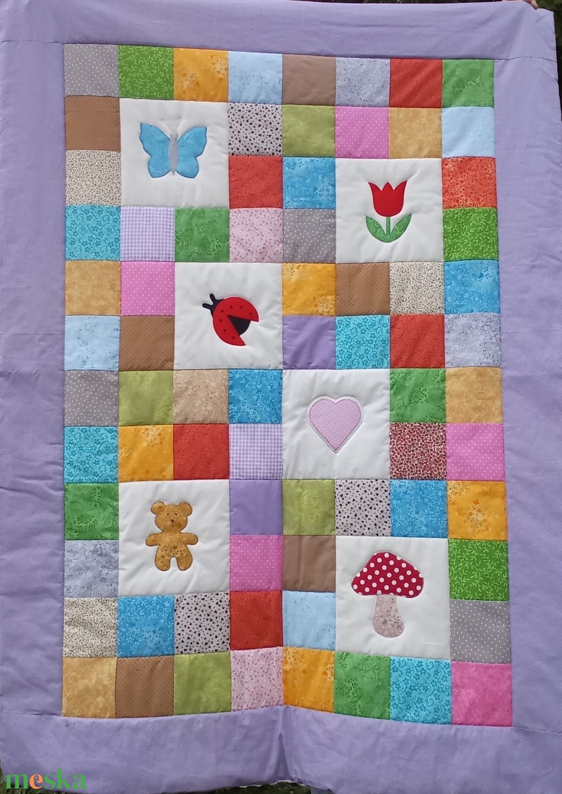 Lila szélű katicás, tulipános takaró akciós termékkép 1