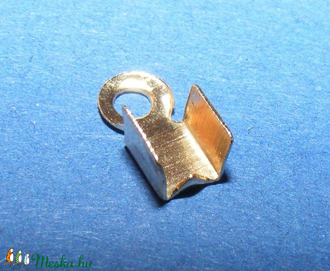 Bőrvég (431/G minta/10 db) - 8x4x3 mm - gyöngy, ékszerkellék - Meska.hu Bőrvég (431/G minta/10 db) - 8x4x3 mm - gyöngy, ékszerkellék - Meska.hu