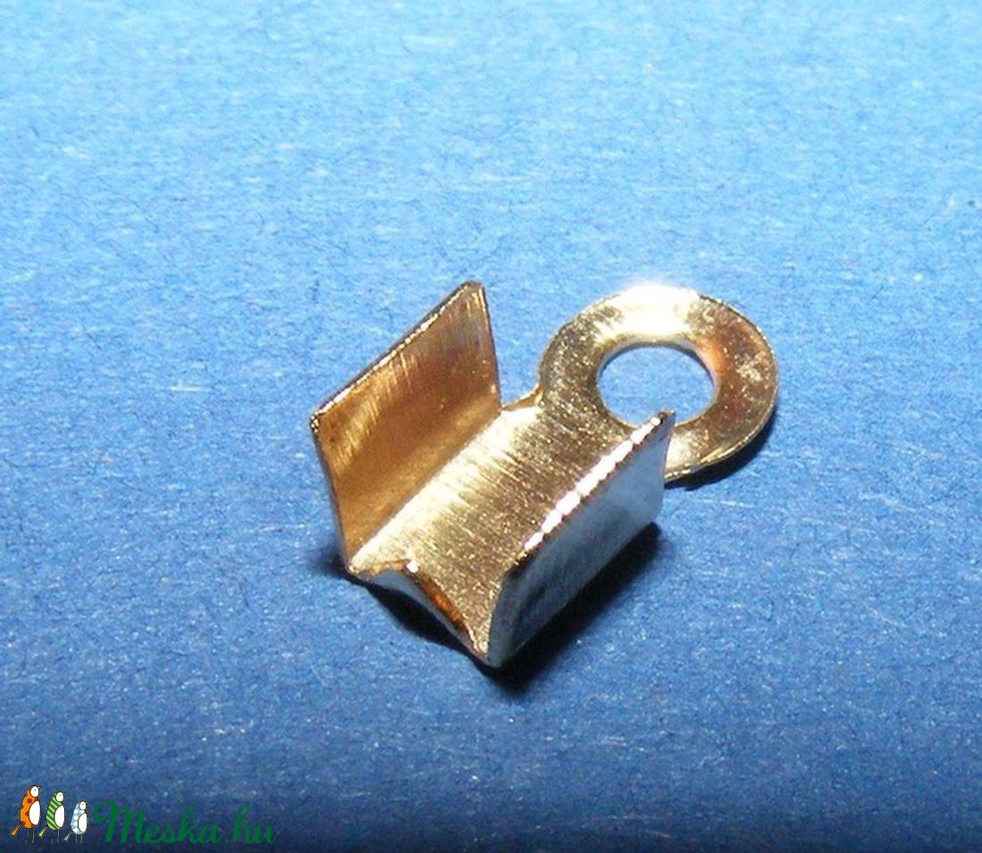 Bőrvég (431/G minta/10 db) - 8x4x3 mm - gyöngy, ékszerkellék - Meska.hu Bőrvég (431/G minta/10 db) - 8x4x3 mm - gyöngy, ékszerkellék - Meska.hu