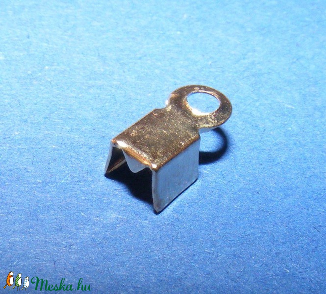 Bőrvég (431/G minta/10 db) - 8x4x3 mm - gyöngy, ékszerkellék - Meska.hu Bőrvég (431/G minta/10 db) - 8x4x3 mm - gyöngy, ékszerkellék - Meska.hu
