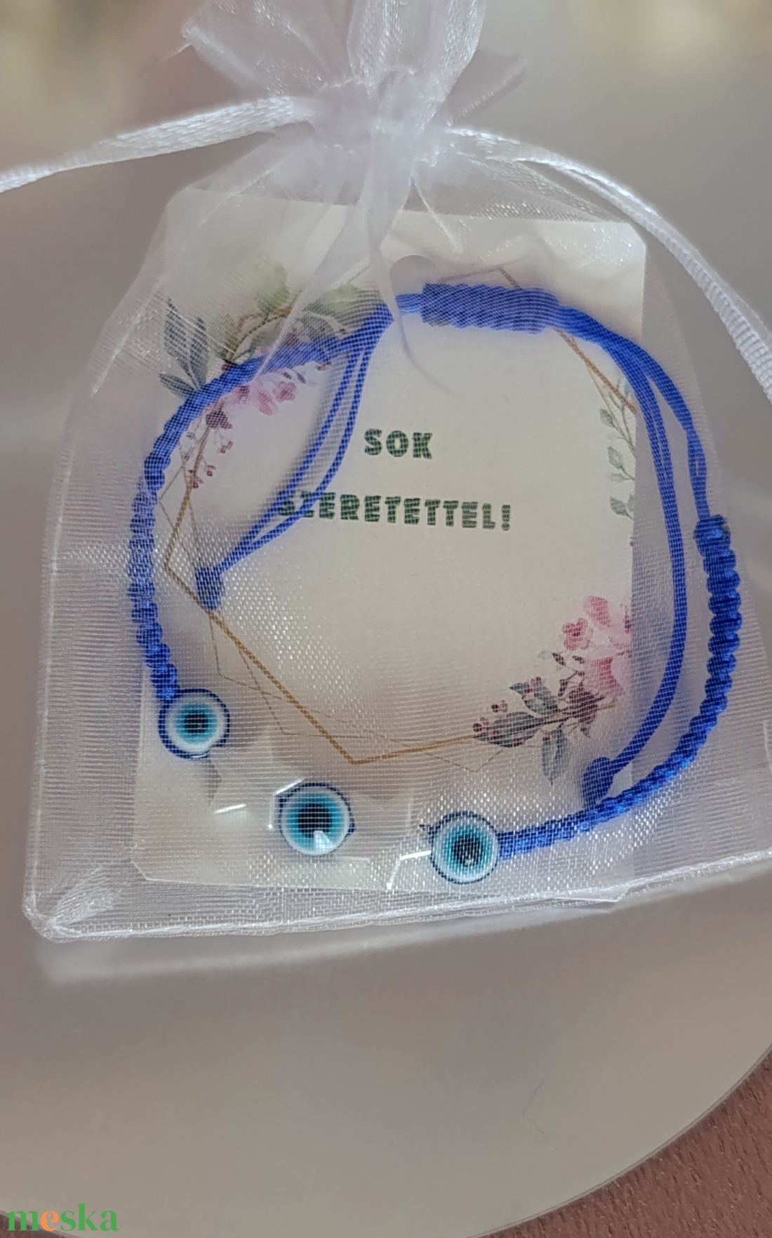 Védelmező szem csomózott karkötő csillagokkal - ékszer - karkötő - fonott karkötő - Meska.hu