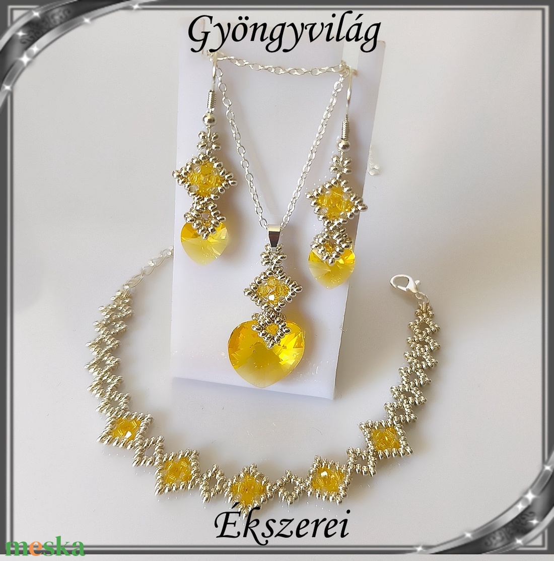 Ékszerek-szettek: Swarovski kristály fülbevaló-medál -10-18mm-es szív szett SSZ-SW 01 Lt.topas - ékszer - ékszerszett - Meska.hu