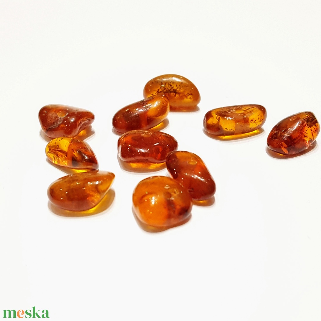 Csiszolt borostyán kövek kifurva - kellékek & szerszámok - gyöngyfűzés kellékek - féldrágakő - Meska.hu
