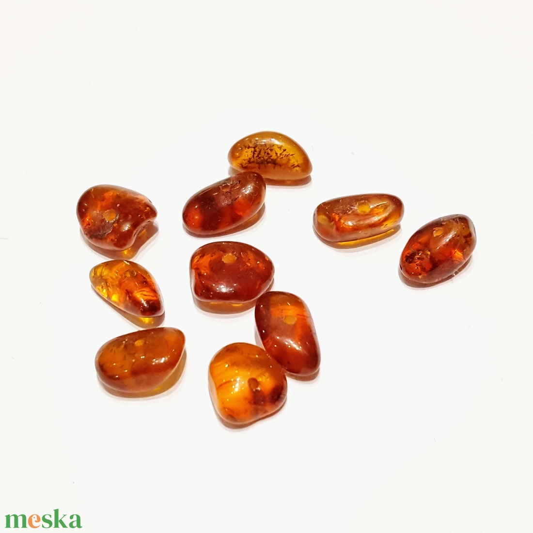 Csiszolt borostyán kövek kifurva - kellékek & szerszámok - gyöngyfűzés kellékek - féldrágakő - Meska.hu