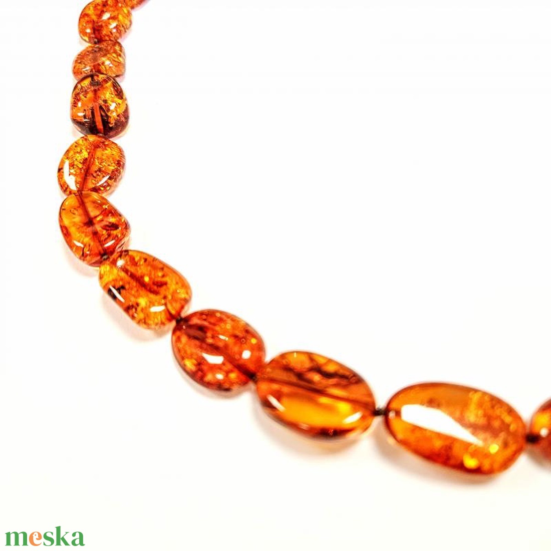 Borostyán gyöngysor lapos ovális kövekből. - ékszer - nyaklánc - bogyós nyaklánc - Meska.hu