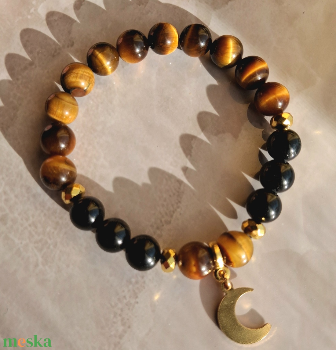 Tigrisszem ásvány karkötő fekete turmalinnal, félhold medállal - ékszer - karkötő - ásványkarkötő - Meska.hu