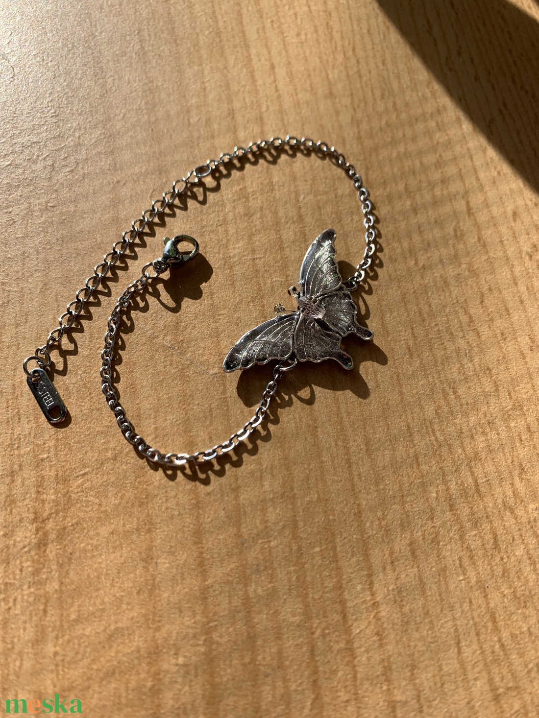 Ezüst pillangós karkötő - ékszer - karkötő - karkötő medállal - Meska.hu