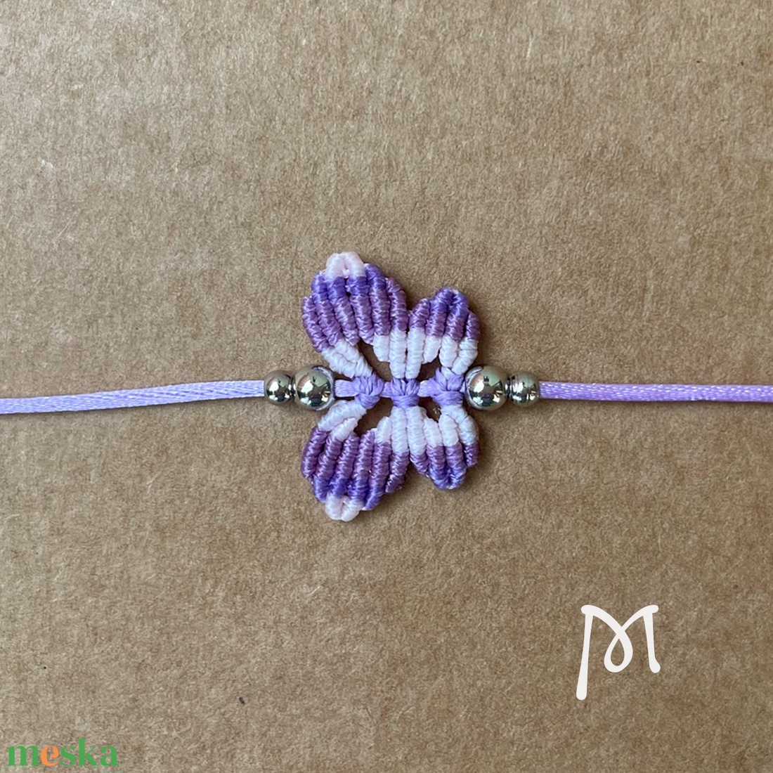 Lila makramé lepke karkötő - ékszer - karkötő - fonott karkötő - Meska.hu