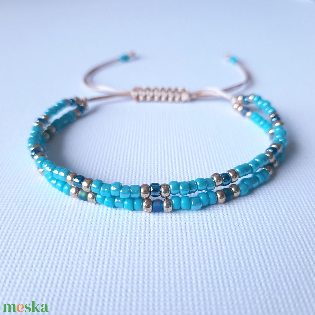 Türkiz, viaszolt zsinóros karkötő - ékszer - karkötő - gyöngyös karkötő - Meska.hu