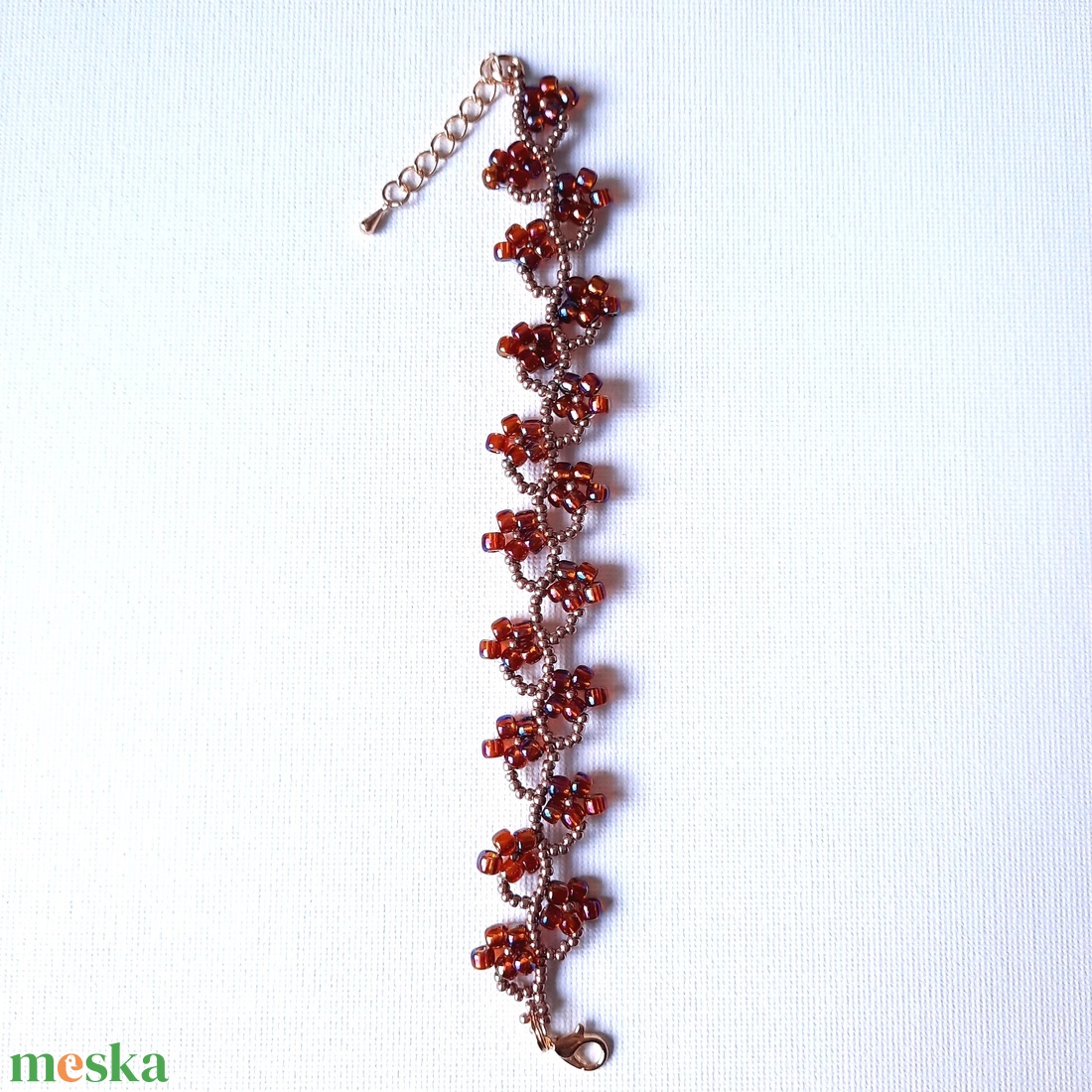 Gyöngyös virágos, szivárványos narancs színű karkötő - ékszer - karkötő - gyöngyös karkötő - Meska.hu