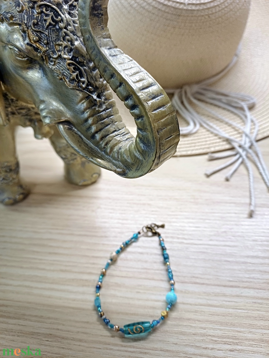 Türkizkék-arany karkötő keleti hangulatban - ékszer - karkötő - gyöngyös karkötő - Meska.hu