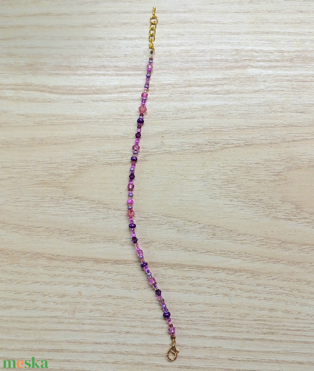 Pink-lila karkötő keleties hangulatban - ékszer - karkötő - gyöngyös karkötő - Meska.hu