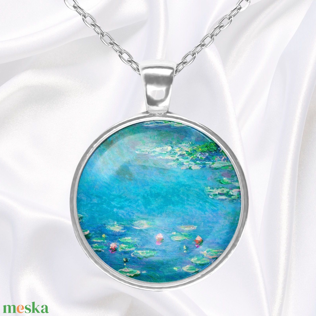 Kék üveglencsés medál vízililiomos Monet-festménnyel - ékszer - nyaklánc - medál - Meska.hu Kék üveglencsés medál vízililiomos Monet-festménnyel - ékszer - nyaklánc - medál - Meska.hu
