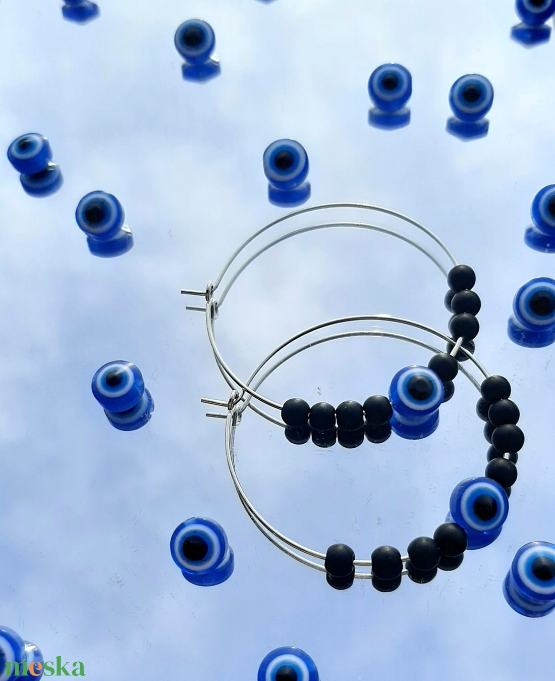 Evil eye ördög szem motívum gyöngyös, matt fekete gyöngyös ezüst színű karika fülbevaló - ékszer - fülbevaló - karika fülbevaló - Meska.hu Evil eye ördög szem motívum gyöngyös, matt fekete gyöngyös ezüst színű karika fülbevaló - ékszer - fülbevaló - karika fülbevaló - Meska.hu