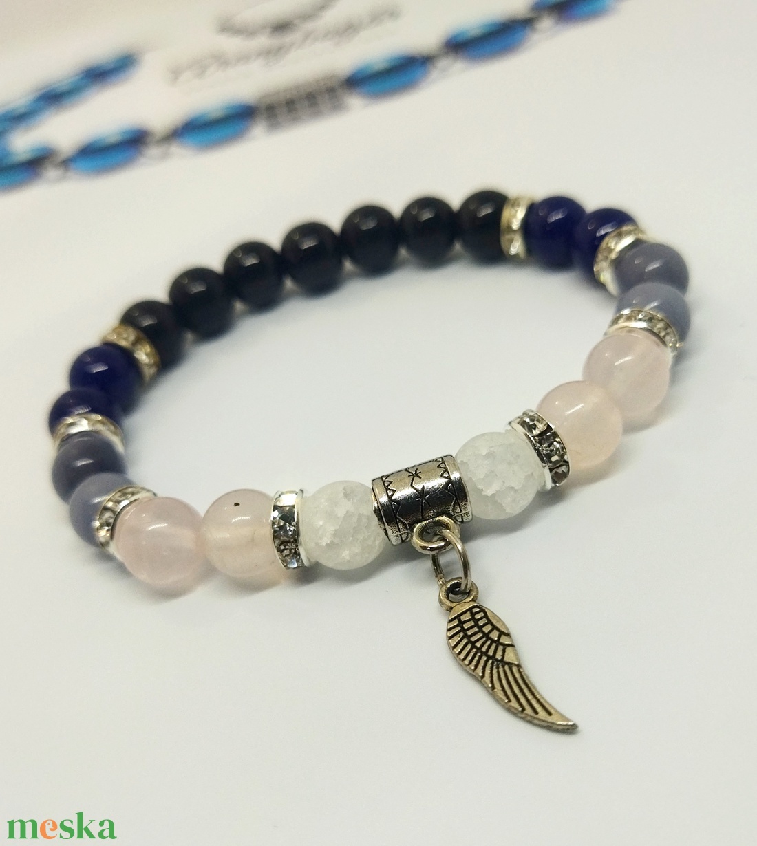Hegyikristály, Rózsakvarc és Ónix ásvány karkötő angyalszárny dísszel - ékszer - karkötő - bogyós karkötő - Meska.hu Hegyikristály, Rózsakvarc és Ónix ásvány karkötő angyalszárny dísszel - ékszer - karkötő - bogyós karkötő - Meska.hu