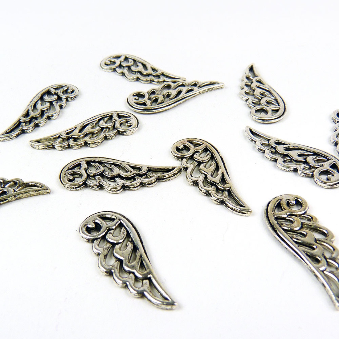 Angyalszárny köztes, ékszerdísz, fityegő, 10x25mm (4db) - kellékek & szerszámok - gyöngyfűzés kellékek - fém köztesek - Meska.hu