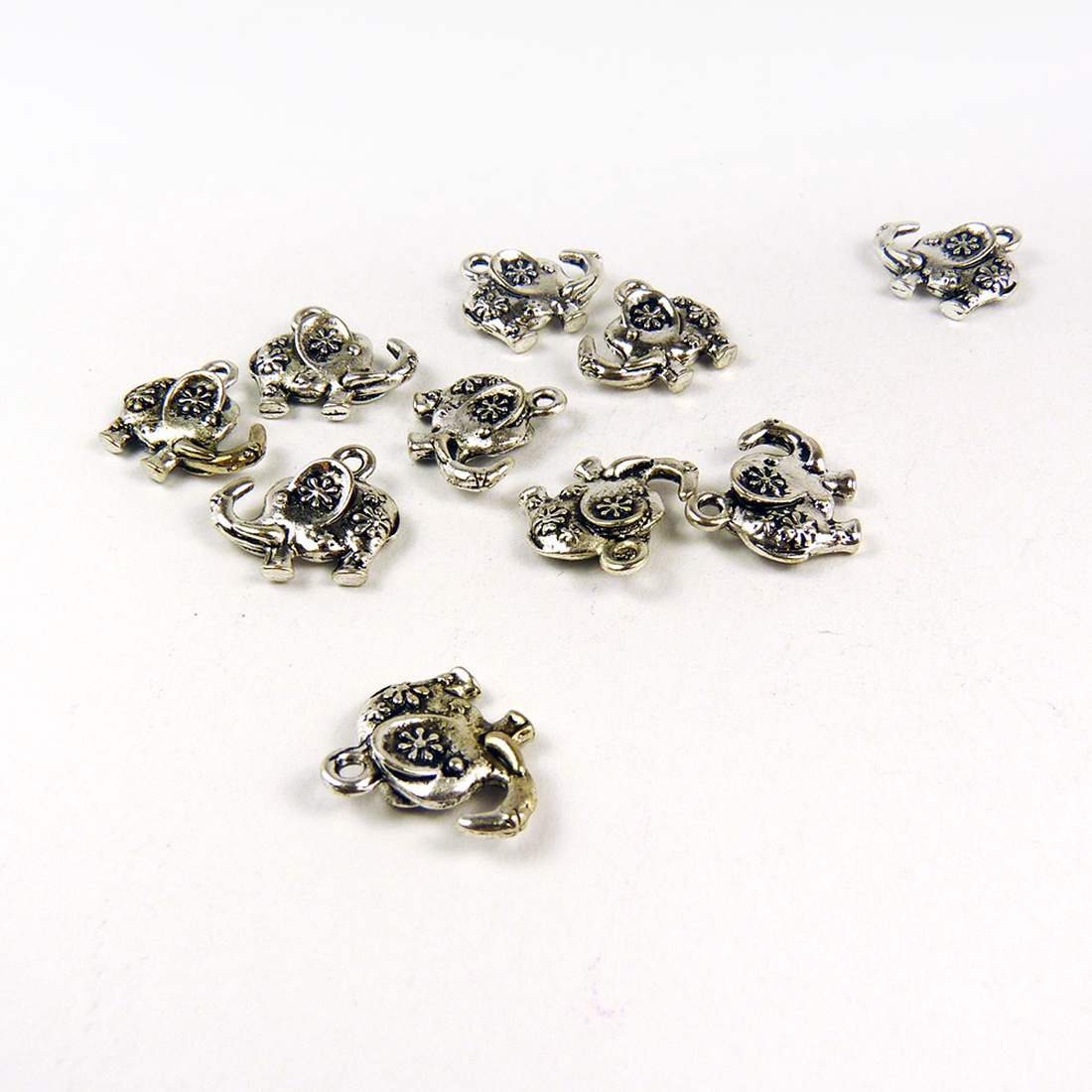 Elefánt ékszerdísz, fityegő, charm 16x14mm (4db) - kellékek & szerszámok - gyöngyfűzés kellékek - fém köztesek - Meska.hu