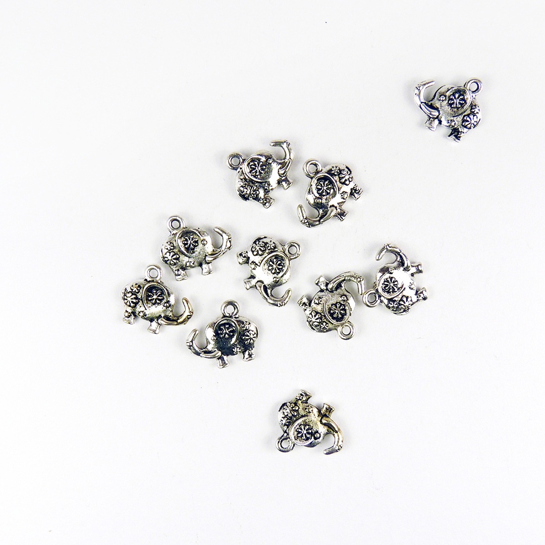 Elefánt ékszerdísz, fityegő, charm 16x14mm (4db) - kellékek & szerszámok - gyöngyfűzés kellékek - fém köztesek - Meska.hu