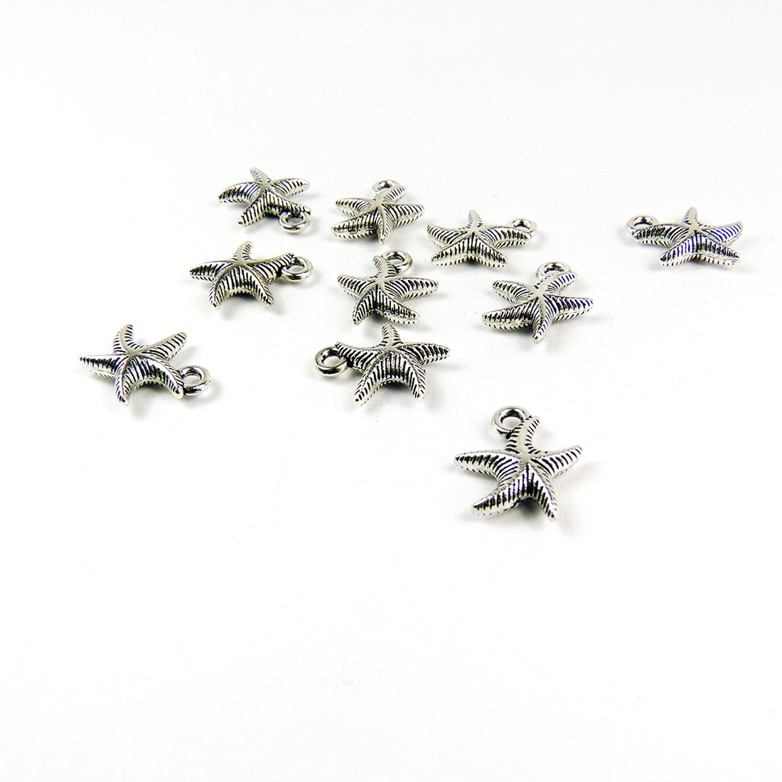 Tengeri csillag ékszerdísz, fityegő, charm 14x17mm (4db) - kellékek & szerszámok - gyöngyfűzés kellékek - fém köztesek - Meska.hu