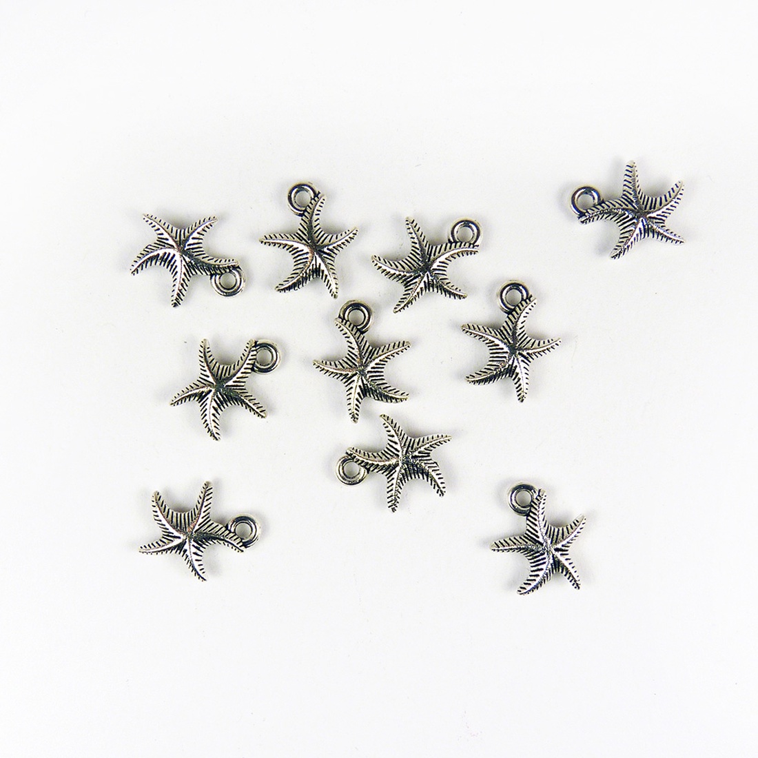 Tengeri csillag ékszerdísz, fityegő, charm 14x17mm (4db) - kellékek & szerszámok - gyöngyfűzés kellékek - fém köztesek - Meska.hu