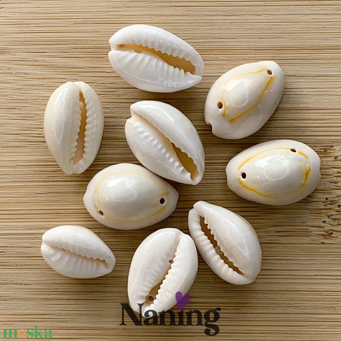 10db duplán fúrt kagyló � kb: 12-18mm � natúr fehér - kellékek & szerszámok - gyöngyfűzés kellékek - egyéb alkatrész - Meska.hu