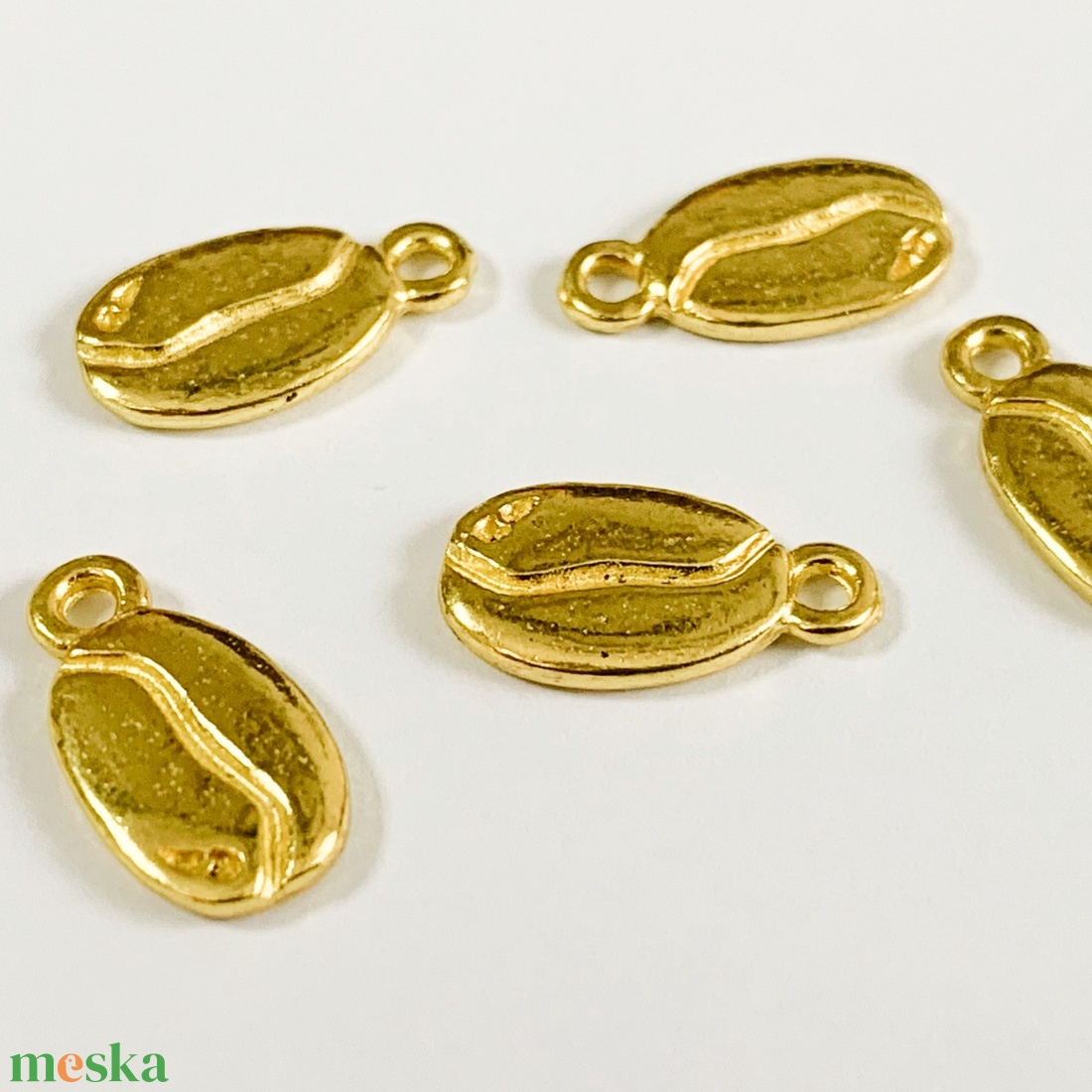 4db KÁVÉSZEM charm - 7x10mm  (80ft/db) - kellékek & szerszámok - ékszerkellék - charmok - Meska.hu