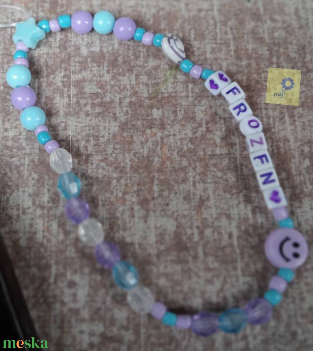 Mobil dísz / phone charm - lila kék árnyalat, frozen felirattal - ékszer - karkötő - charm karkötő - Meska.hu Mobil dísz / phone charm - lila kék árnyalat, frozen felirattal - ékszer - karkötő - charm karkötő - Meska.hu