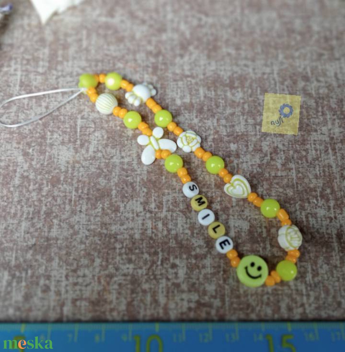 Mobil dísz / phone charm - sárga árnyalat, smile felirattal - ékszer - karkötő - charm karkötő - Meska.hu Mobil dísz / phone charm - sárga árnyalat, smile felirattal - ékszer - karkötő - charm karkötő - Meska.hu