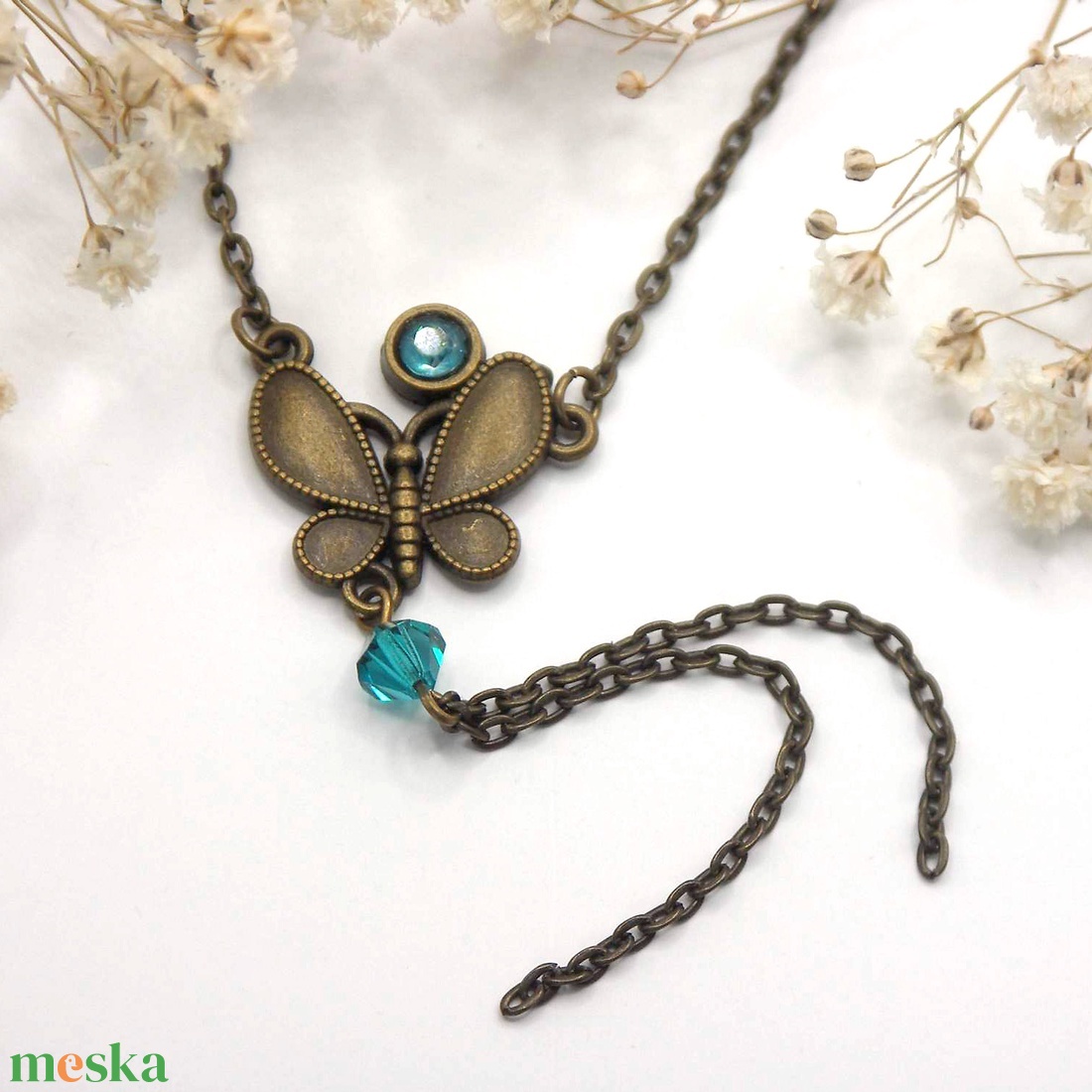 Antik bronz lepke medál apró, lagúnakék Swarovski gyöngyökkel - Papilio - ékszer - nyaklánc - medálos nyaklánc - Meska.hu