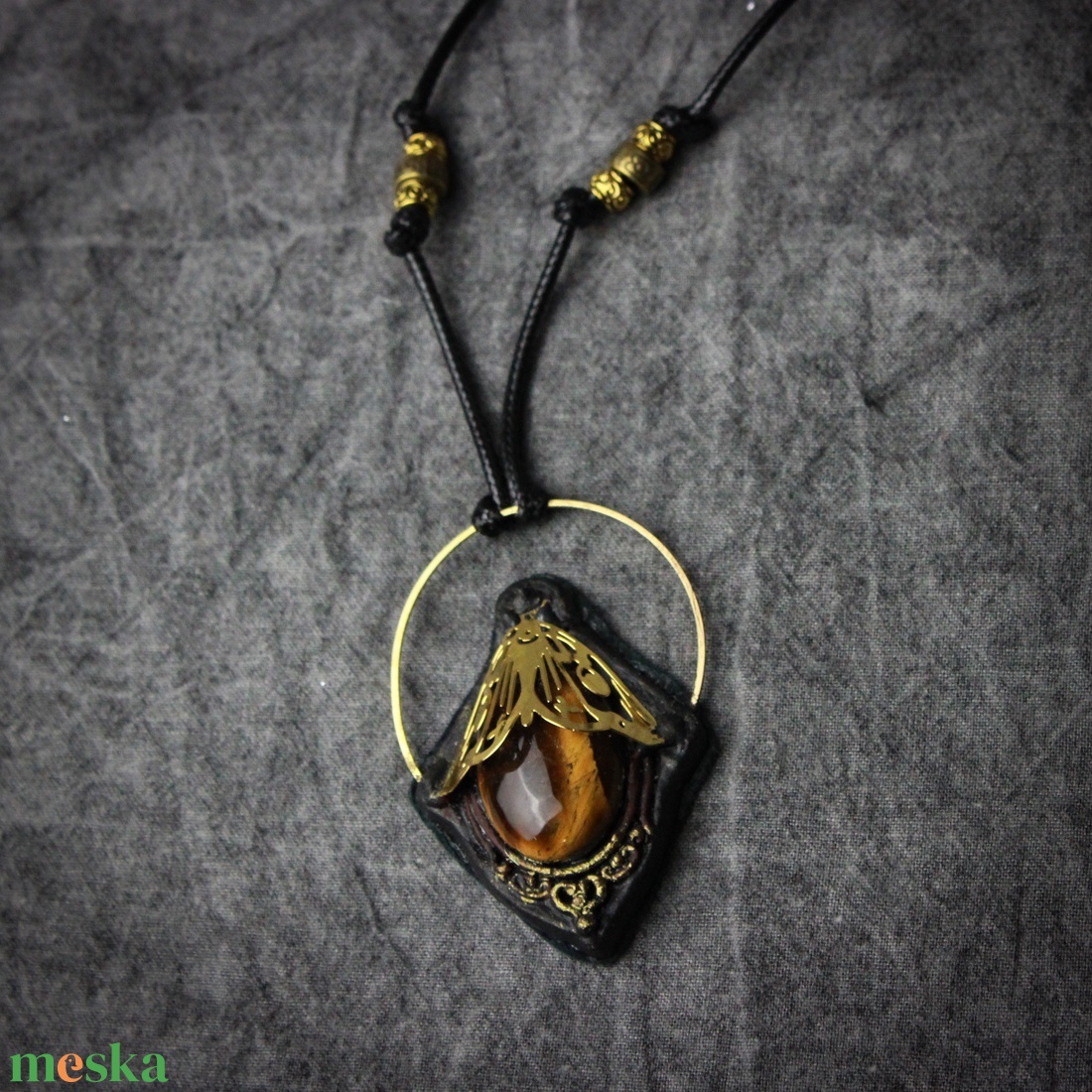 Molylepke amulett tigrisszem kővel - ékszer - nyaklánc - medál - Meska.hu Molylepke amulett tigrisszem kővel - ékszer - nyaklánc - medál - Meska.hu