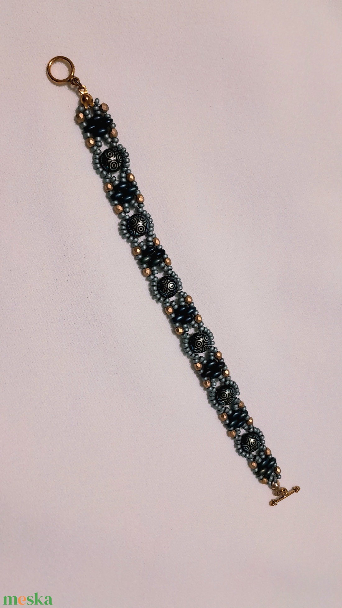 Fekete-türkiz-arany karkötő - ékszer - karkötő - gyöngyös karkötő - Meska.hu