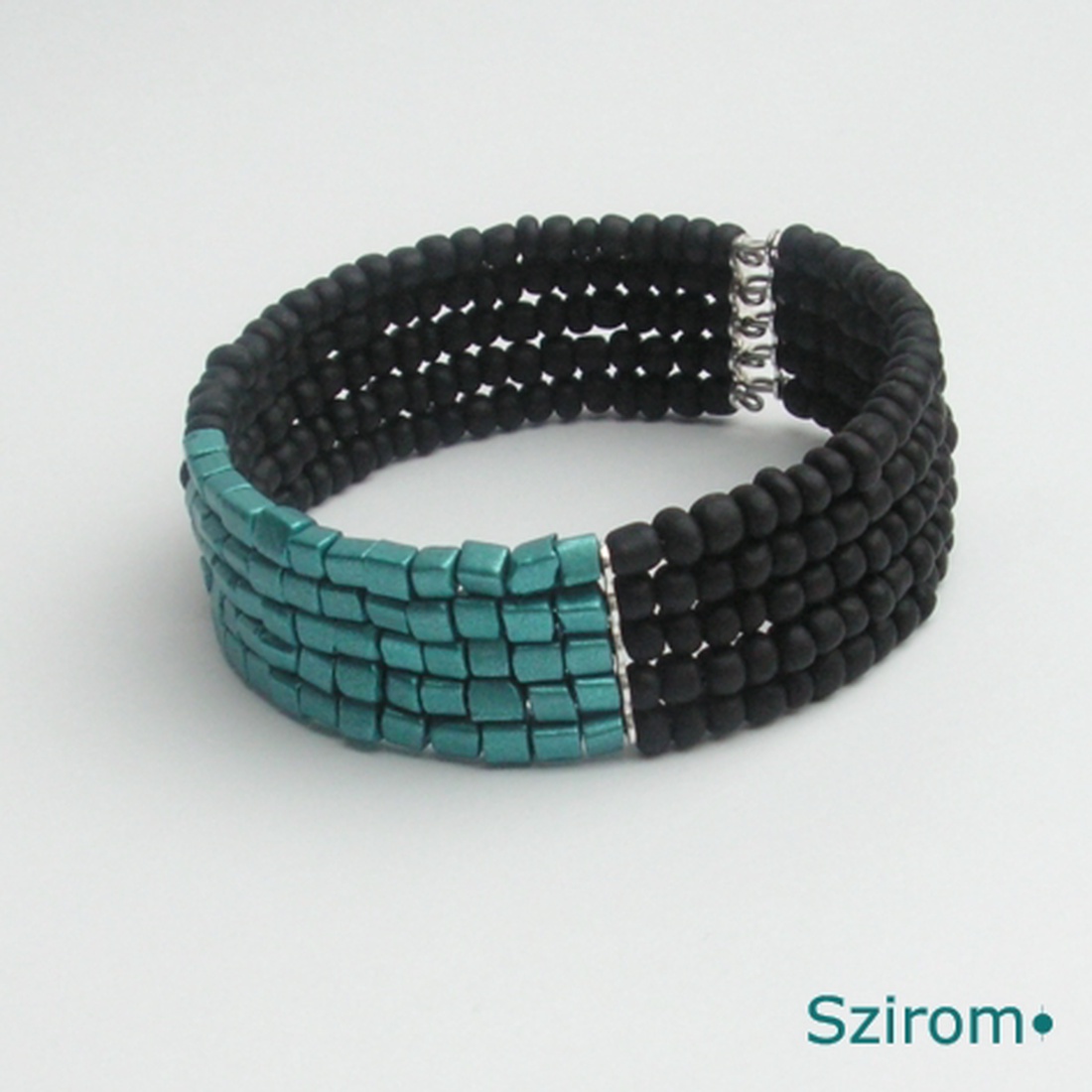 Sikeres nő - fekete és türkiz színű karkötő -  - Meska.hu