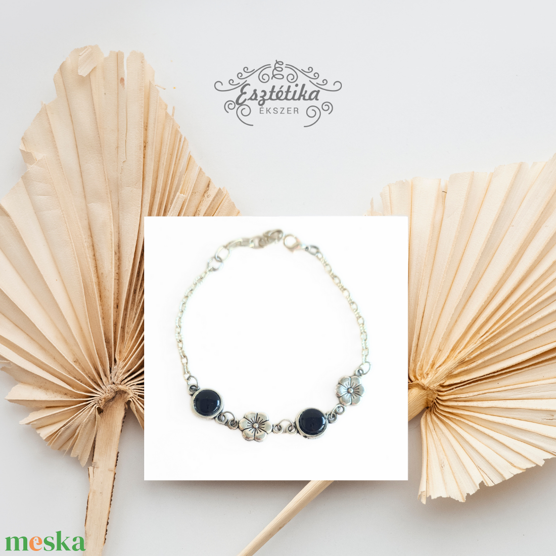 Fekete, virágos nemesacél karkötő - ékszer - karkötő - lánc karkötő - Meska.hu